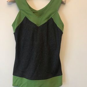 Black and green activewear top and matching jacket. Sleeves zip open and close
